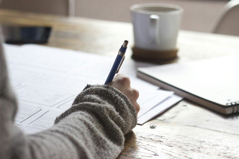 Person writing notes